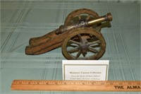 Miniature wood and brass 12" long cannon from the