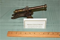 Miniature brass 9" long cannon from the desk of Cl