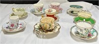 Group of bone china teacups & saucers