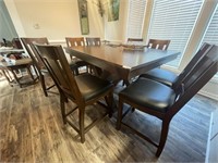 Pub style dining table with 6 chairs