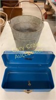 Galvanized bucket and metal box with key