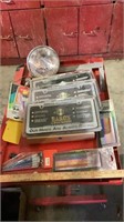 Various painting brushes, license plate covers,