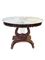 CHERRY LYRE BASE OVAL MARBLE TOP TABLE