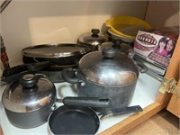 Cabinet lot - Circulon pans, skillets, strainers