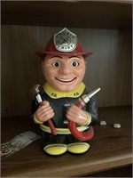 Plastic fireman cookie jar