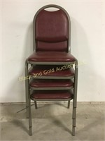 4 stackable metal chairs with cushions
