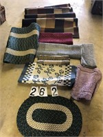 9 Throw rugs all different sizes