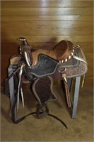 Mexican tooled leather saddle; as is