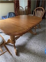 Oak table (per owner )with six chairs extra leaf