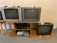 (3) Working TVs/ (2) VCRs & Cabinet