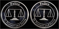 (2) 1 OZ .999 SILVER POLICE ROUNDS