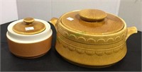 Two piece vintage stoneware includes a covered