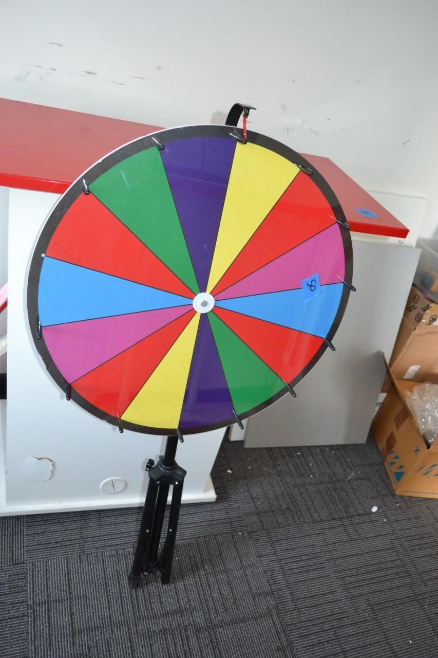 50: Prize spinner wheel.