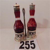 CUT TO CLEAR CRANBERRY GLASS SHAKER SET IN METAL
