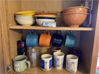 Cabinet with bowls and coffee mugs