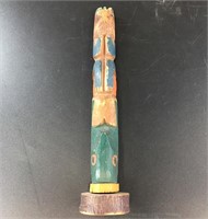 Small Tlingit totem pole, bears artist's device, 9
