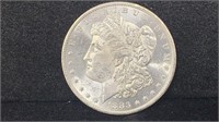 1883-O Silver Morgan Dollar mirror-finish higher