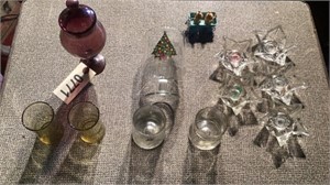 Assortment of glasses, candle holders
