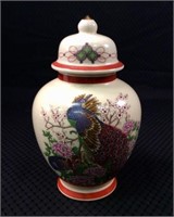 Porcelain 8.5" tall ginger jar with peacock design