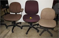 Three Upholstered Swivel Office Chairs