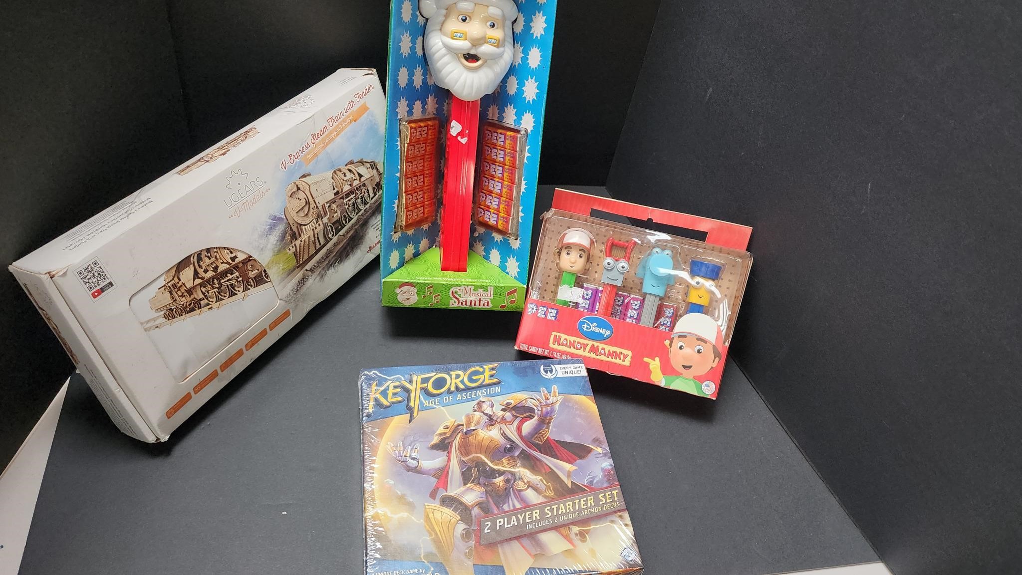 Pez Dispensers, Key Forge and Wooden Train Model