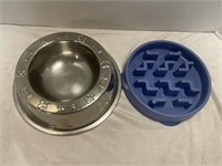 Pair of pet bowls. One is a maze.