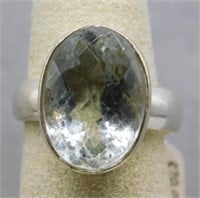 Sterling Silver ring with clear stone, size 6.