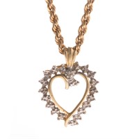 A Lady's Diamond Heart Pendant on a Rope Chain