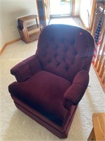 Upholstered swivel and rocking chair