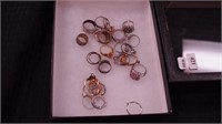 Group of costume rings, some with imperfections