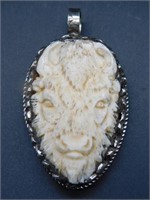 CARVED BONE BISON PENDANT WITH INTRICATE TOOLING