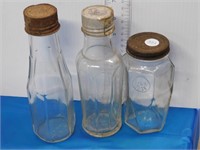 3 SMALL BOTTLES WITH LIDS