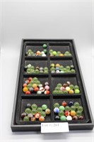 Marbles including radioactive Vaseline glass