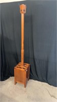 cut wooden coat rack with umbrella storage 70 in