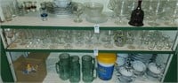 Shelf of random glassware.