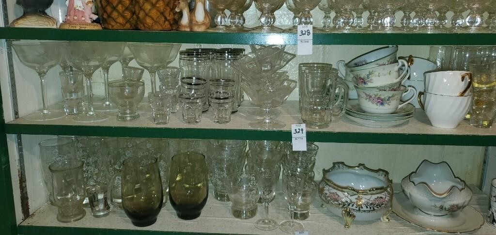 Shelf of random glassware.