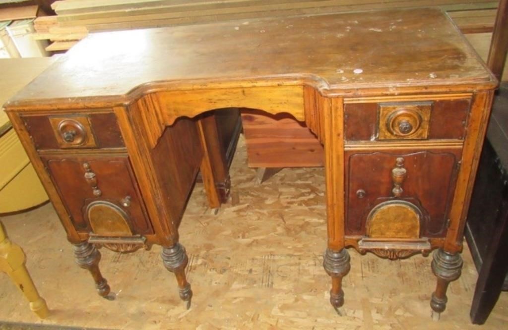 Antique desk on casters, 31.5"T x 45"W x 20"D.