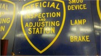 Official Inspection & Adjusting Station sign