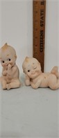 2 vintage cupid piano baby statues.  Made by