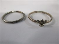 Two sterling, silver rings, size 6, and 8
