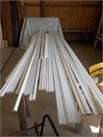 Assortment of primed wood molding various