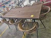 PATIO TABLE WITH COMPOSITE TOP AND (8) CHAIRS