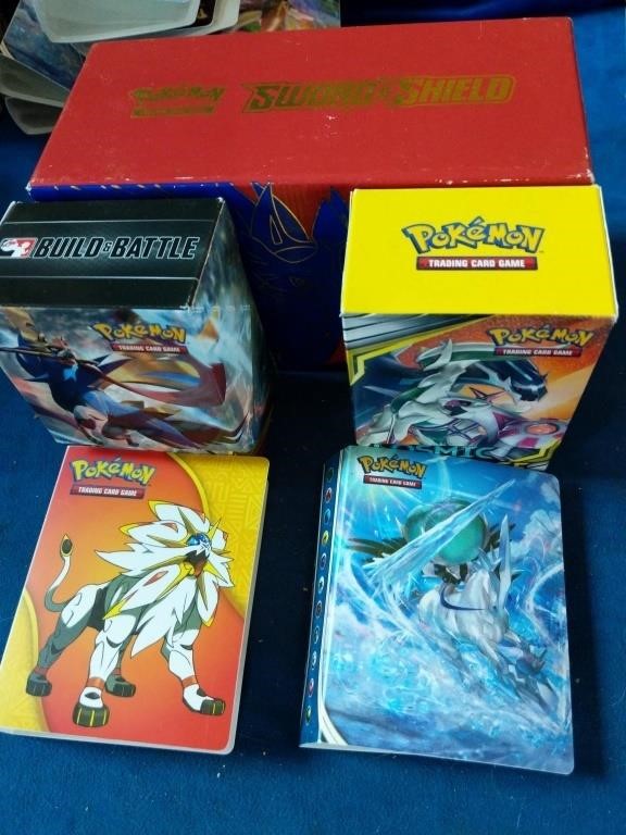 Pokemon boxes full of cards and empty mini