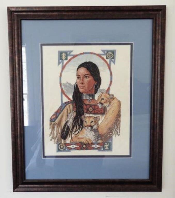 Framed needlepoint of Indian and lions 19” x23"