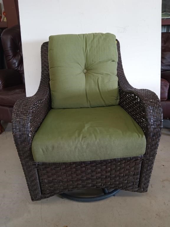 Wicker style patio swivel rocker, has some wear