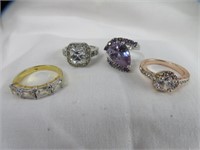 4 LADIES RINGS (SIZE 8, 8.5 & 10)