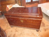 ornately carved wooden chest