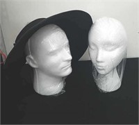 Two styrofoam heads and a bonnet