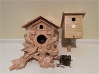 Vintage carved cuckoo clock and birdhouse