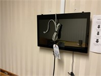 Wall mounted computer monitor.